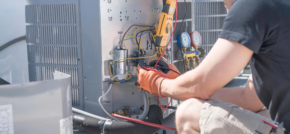 ac installation hands holding hvac tool tucson az